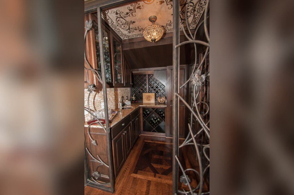 A kitchen with a sink and a refrigerator
