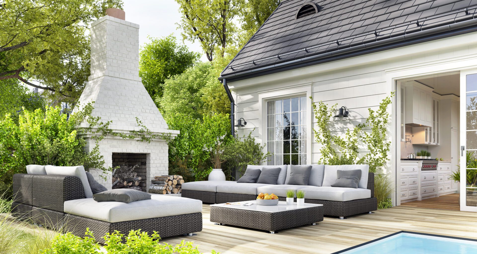 Outdoor patio with fireplace and furniture.