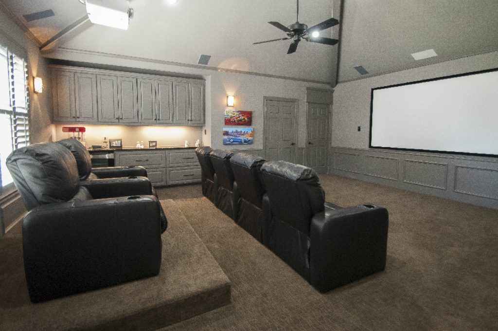 A room with several couches and chairs in it