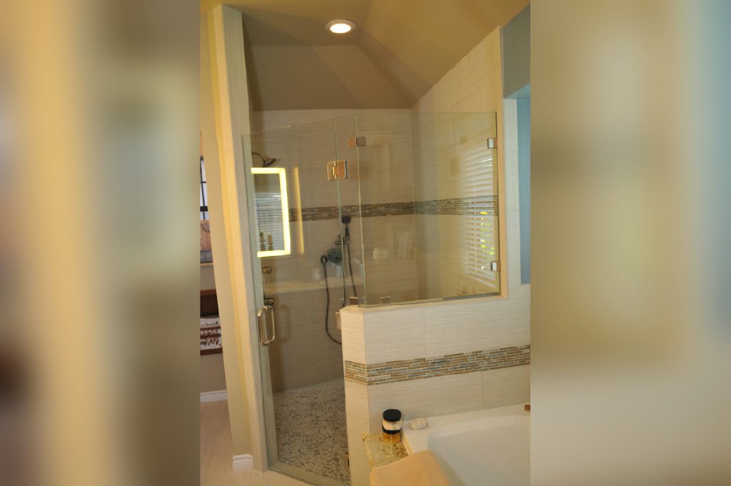 A bathroom with a shower and toilet in it